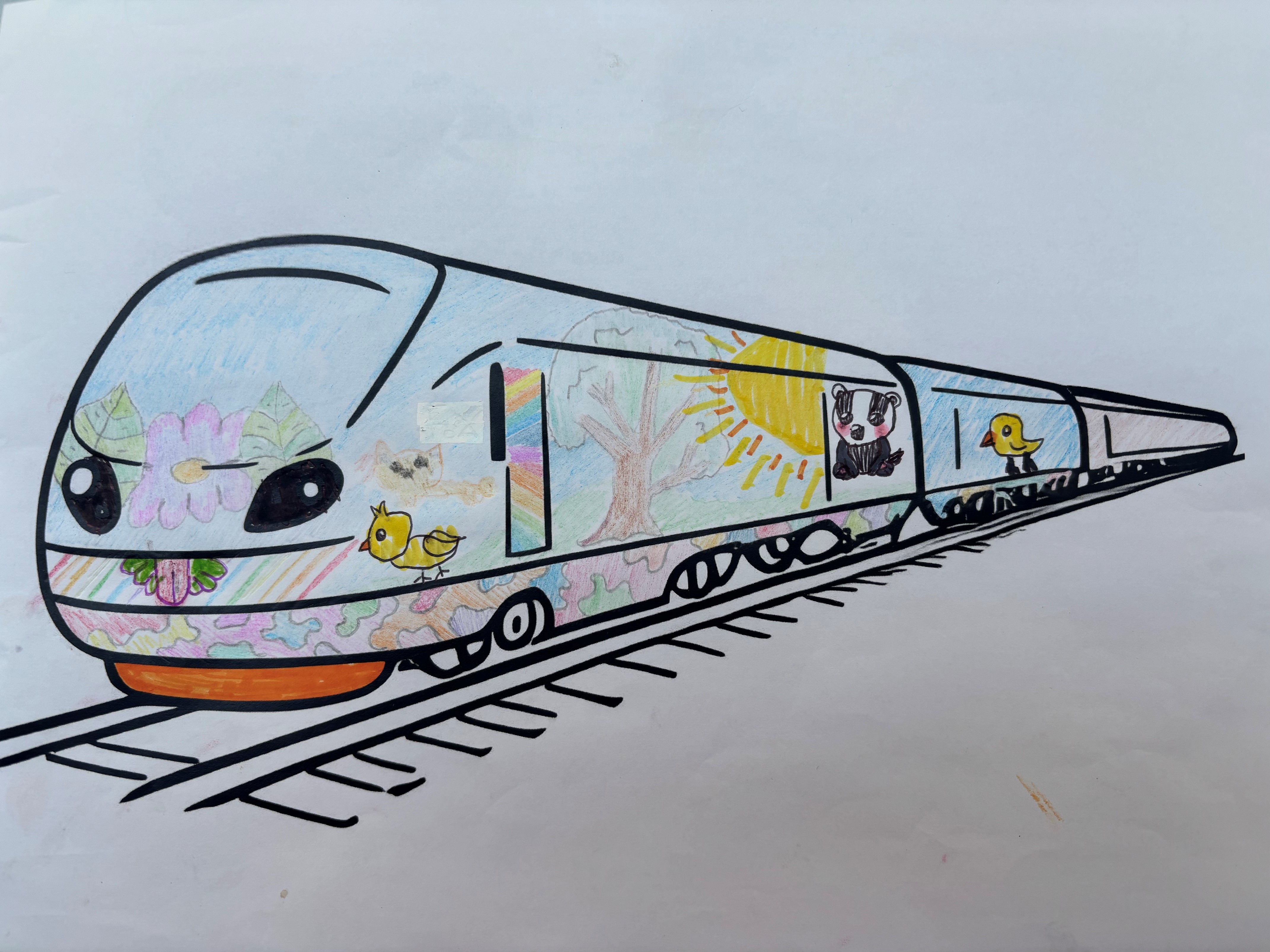 Outline of a train decorated with a sun and flowers