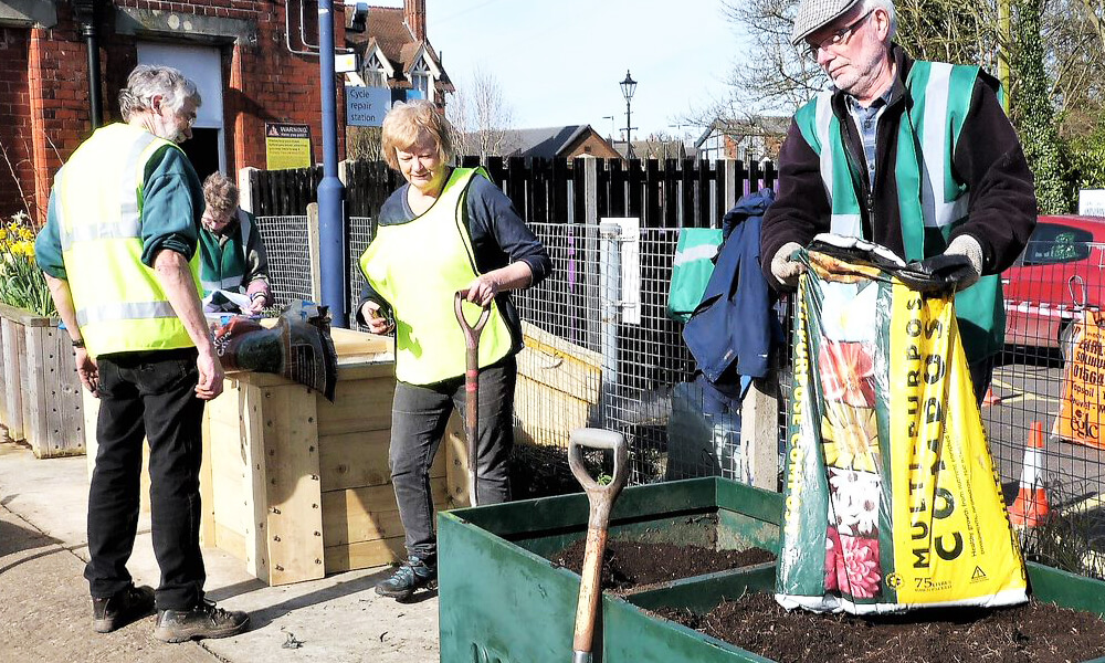 Group of people helping out at Dorridge station