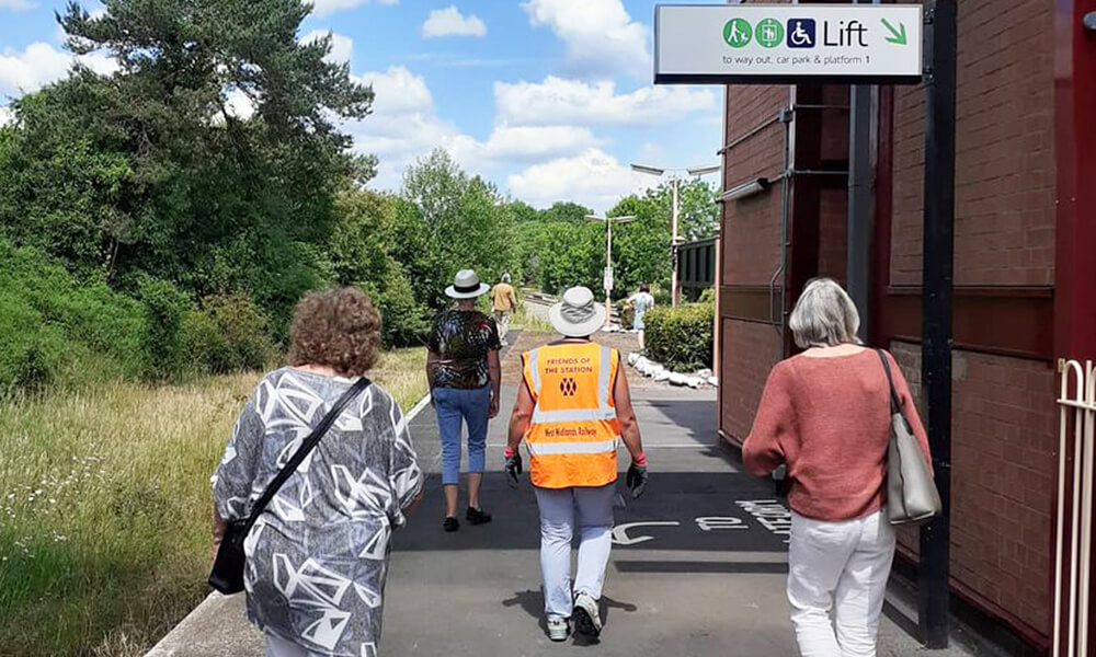 Group of people helping out at Henley in Arden station